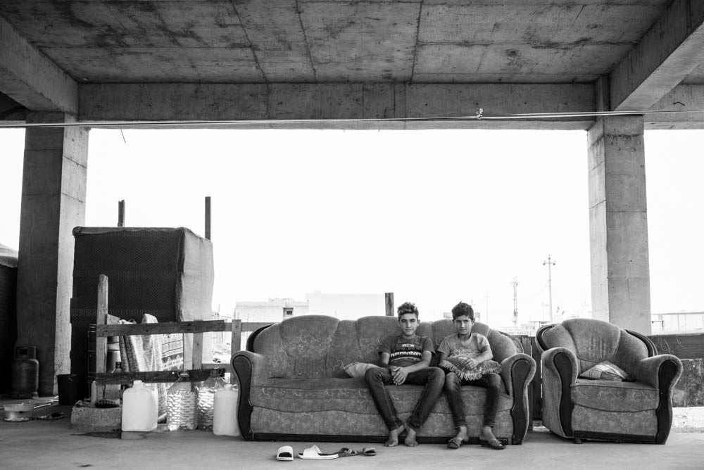  تصوير الكساندر افونسو - نازحون ايزديون لا يملكون شيئا لكنهم يهبون كل شيء 